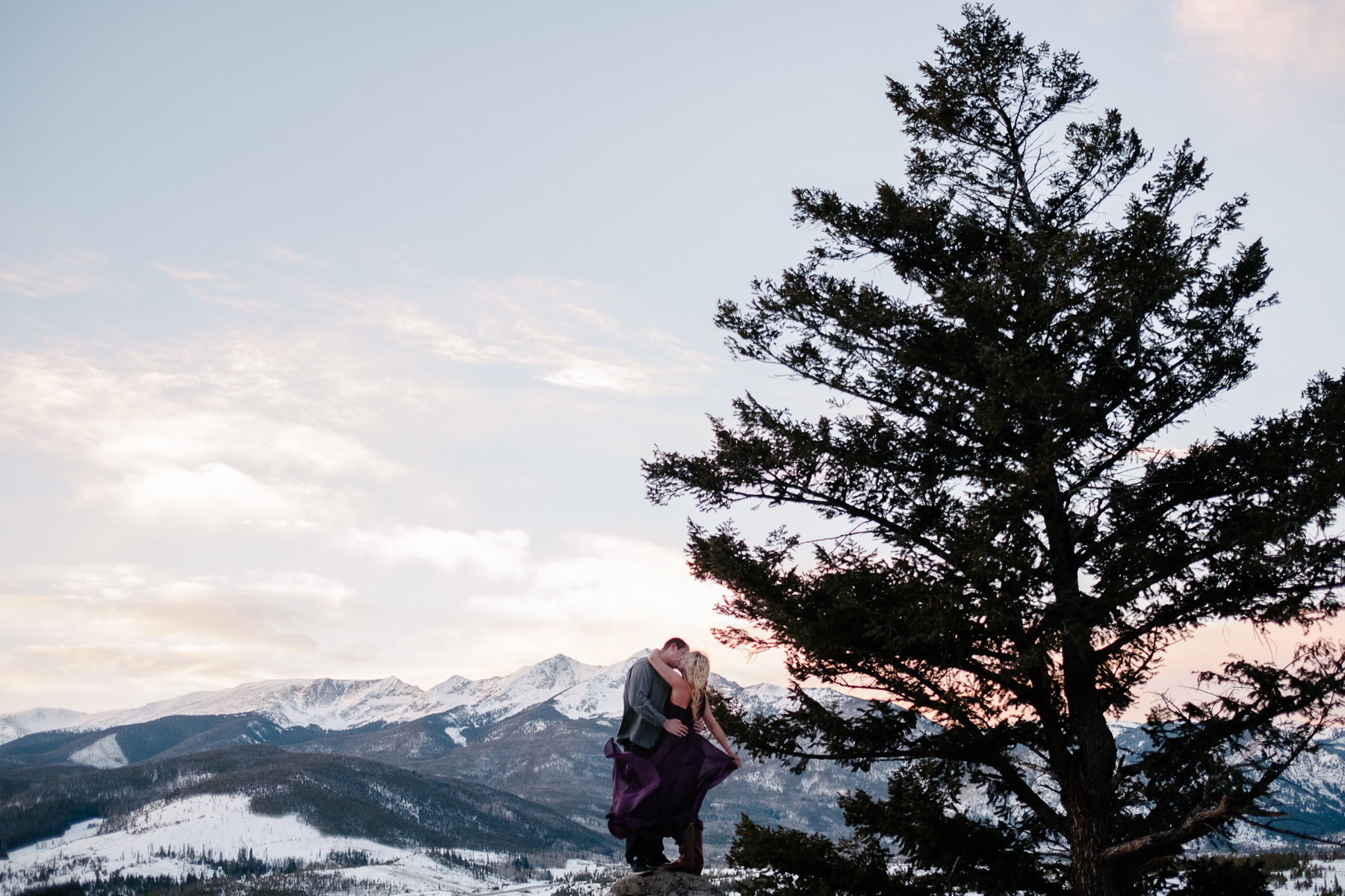 Caryn and Nate explore Breckenridge during their adventure engagement session.